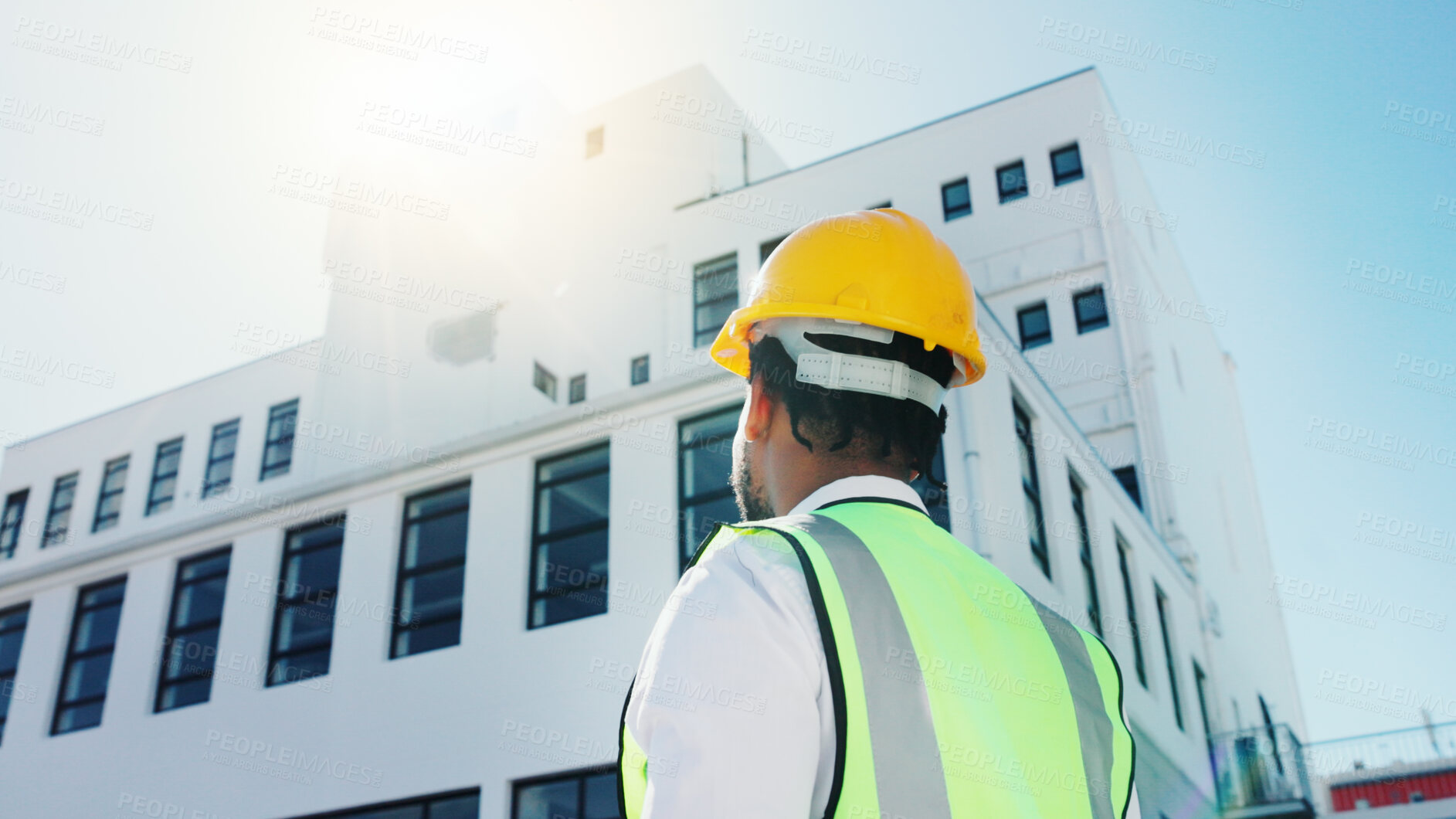 Buy stock photo Thinking, construction and back of man in city for planning, inspection and building renovation. Architecture, civil engineer and person with idea for infrastructure, urban development and remodeling