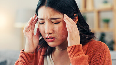 Buy stock photo Pain, headache and Asian woman in home with stress for strain, migraine and medical crisis. House, health and upset person with tension, brain fog and massage temples for fatigue and pressure