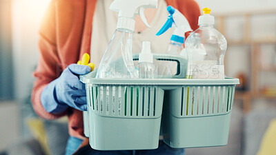 Buy stock photo Hands, person and basket with detergent at house for hygiene, housekeeping and spring cleaning. Cleaner, equipment and gloves for sanitation, household maintenance and bacteria prevention in lounge