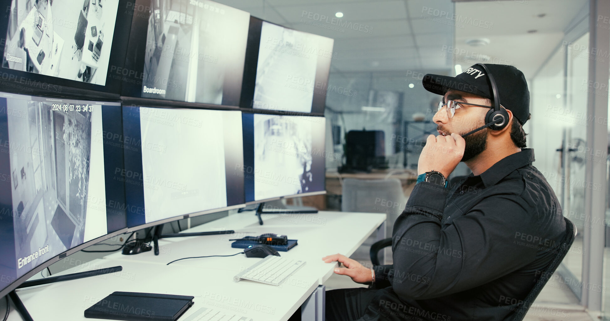 Buy stock photo Security, control room and man with headset by monitor for communication, surveillance or report. Safety officer, computer screen and technology to talk about breach, property inspection or dispatch