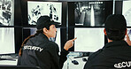 Team, talk and security guard in control room for video surveillance, observation or safety compliance. Law enforcement, people and discussion in workplace for crime prevention, monitor CCTV or plan.