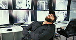 Man, security and sleep in control room with monitor for job, tired and exhausted with overtime. Person, surveillance technician and safety worker with fatigue, burnout or screen for crime prevention