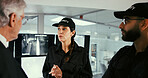 People, security guard and meeting with group in control room with director for safety planning. Team, woman and men with discussion, review and explain with surveillance system for crime prevention