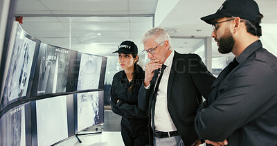 Buy stock photo Monitor, manager or security guard with meeting in control room, video footage or check cctv blind spot. Computer screen, team or people planning for camera weak point, company safety or surveillance