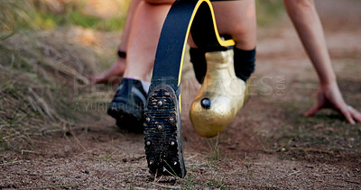 Buy stock photo Runner, start and running with prosthetic leg in nature for sprint, fitness or outdoor workout on trail. Active, back or person with disability getting ready to begin cardio exercise or wellness