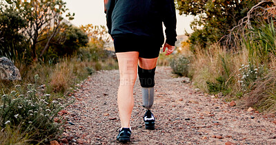 Buy stock photo Legs, athlete and prosthetic limb for hiking with exercise, workout and health benefits. Prosthesis, fitness and person with disability outdoor for adventure, hobby and rehabilitation in Canada