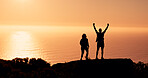 People, silhouette and hiking with success on mountain cliff for achievement or accomplishment. Sunset, hikers or team with fist pump in nature for trekking journey, freedom or conquer on space