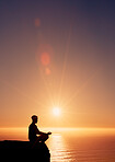 Sunrise, meditation and man on cliff by ocean for reflection, mindfulness and peace in morning. Mountain, nature and person with calm for mental health, wellness and balance with horizon space
