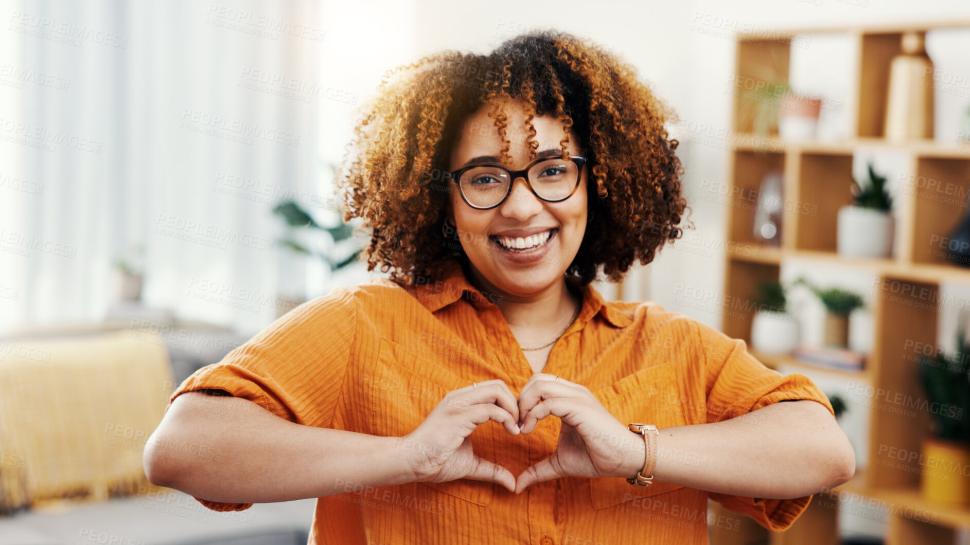 Buy stock photo Love, heart hands and portrait of woman in home for romance, positive gesture and kindness. Peace, support and emoji with female person in living room of apartment for emotion, hope and happy