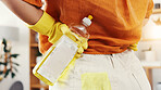 Cleaning, bottle and hands of woman in home for chemicals, sanitary tools and bacteria prevention. Spray, housekeeping and disinfection product with person in apartment for equipment and supplies