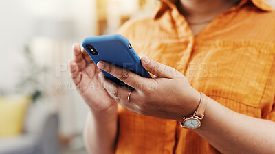 Buy stock photo Texting, phone and hands with woman in home for dating app, social media and text message. Matchmaking website, online relationship forum and communication with person and mobile in living room