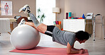 Woman, patient and exercise ball with prosthetic leg for muscle rehabilitation or balance in clinic. Active, workout or female person with a disability on mat for core, planking or physical training