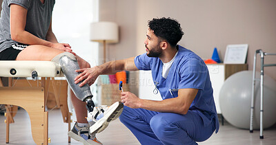 Buy stock photo Physiotherapist, explain and leg with people, conversation and rehabilitation for person with disability. Advice, wellness or consultation for medical prosthetic, physical therapy or man with woman