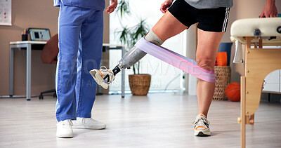 Buy stock photo Physiotherapist, resistance band and leg with prosthetic for muscle rehabilitation or exercise. Doctor, patient or person with a disability for workout, recovery or mobility training in clinic