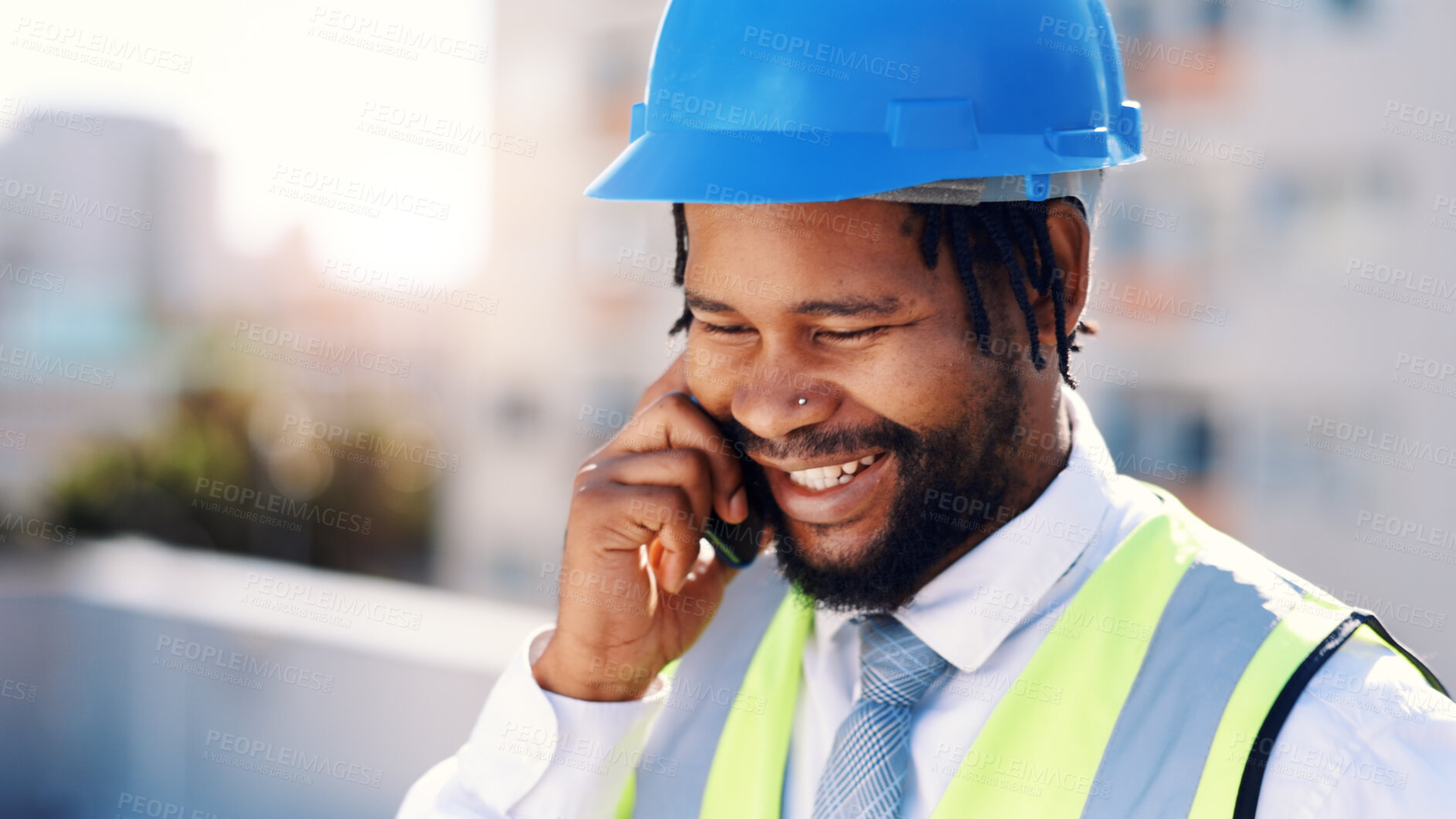 Buy stock photo Happy, black man and architect with phone call in city for construction plan, conversation or chat. Male person, civil engineer or talking with smile or hard hat on smartphone for discussion in town