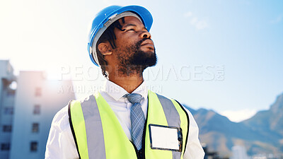 Buy stock photo Black man, architect and thinking with helmet in city for building, construction or security. Thoughtful, male person or civil engineer with ambition or vision for architecture on site in urban town