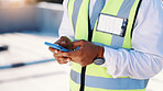 Man, hands and architect typing with phone in city for construction planning or maintenance app. Male person, engineer or building technician with mobile smartphone for architecture or security