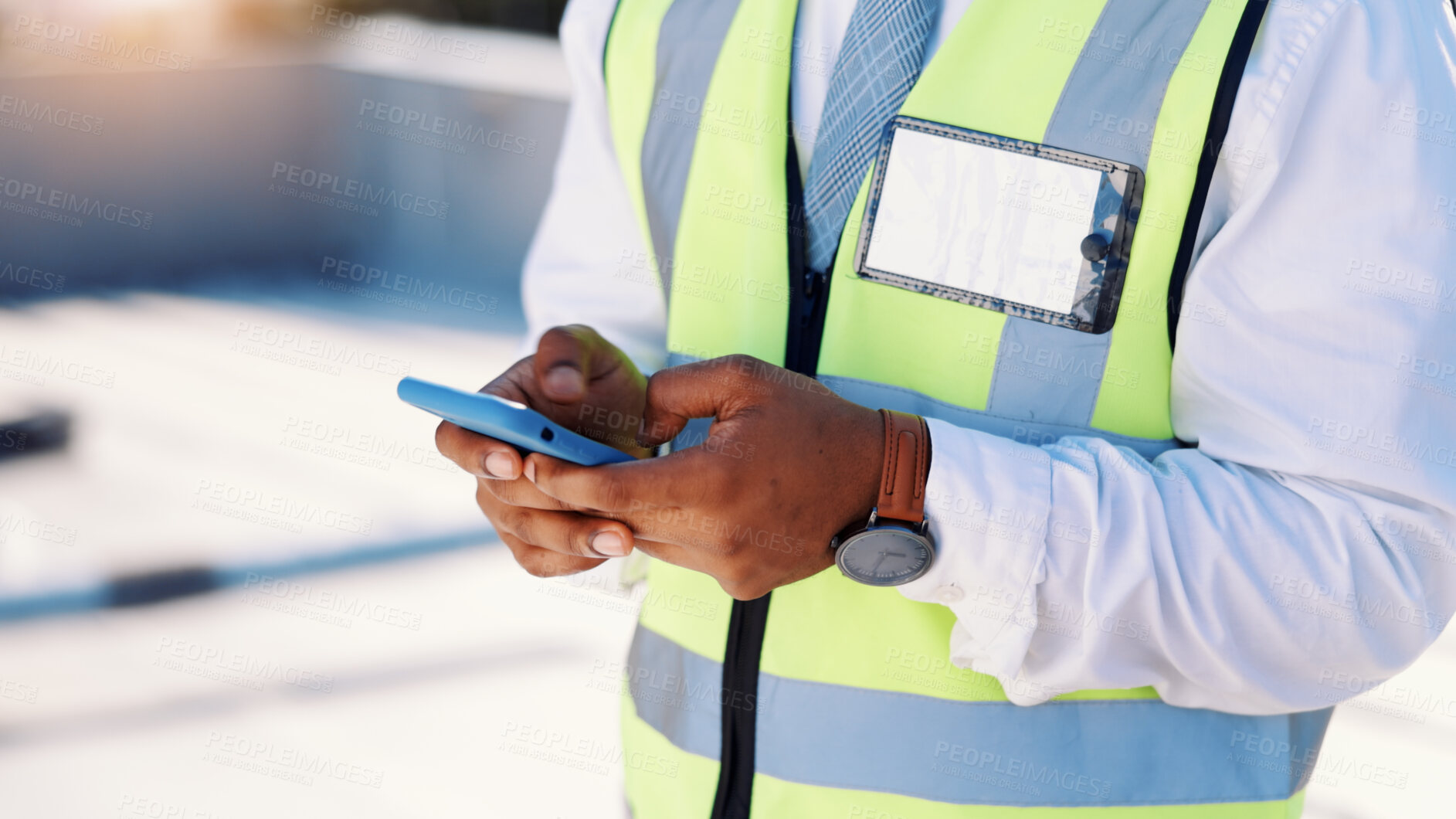 Buy stock photo Man, hands and architect typing with phone in city for construction planning or maintenance app. Male person, engineer or building technician with mobile smartphone for architecture or security