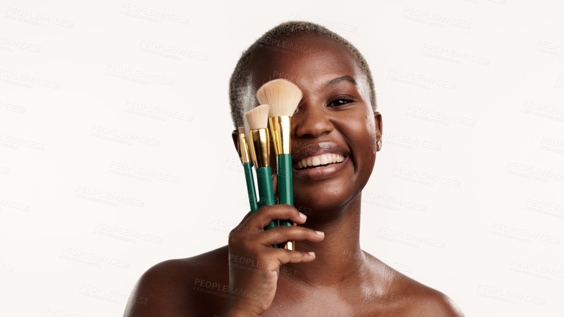 Buy stock photo Portrait, smile and black woman in studio with makeup brush, wellness and product for beauty routine. Happy, female person and cosmetic tools for grooming, self care or foundation on white background