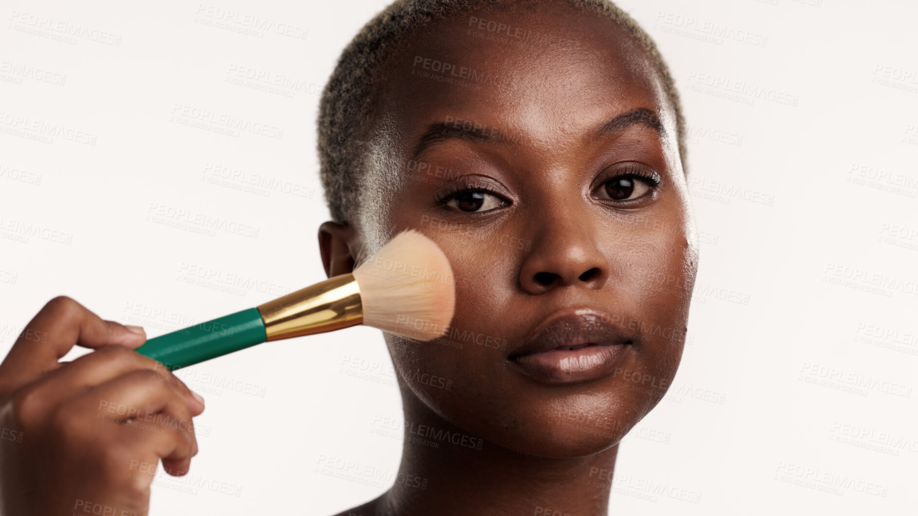 Buy stock photo Portrait, beauty and black woman in studio with makeup brush, application and product for cosmetics. Person, self care and tools for grooming routine, glow and apply foundation on white background.