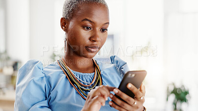 Buy stock photo Black woman, phone and texting at startup in office with contact, typing and notification at real estate agency. Person, realtor or property developer with smartphone, mobile app and web chat at job