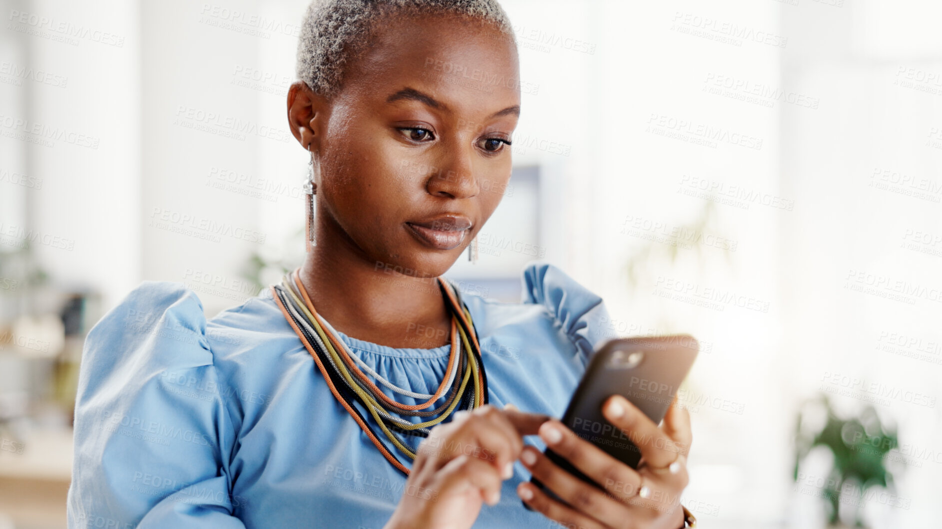 Buy stock photo Black woman, phone and texting at startup in office with contact, typing and notification at real estate agency. Person, realtor or property developer with smartphone, mobile app and web chat at job