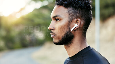 Buy stock photo Man, fitness or nature with earphones for outdoor workout, exercise or music on space. Active, male person or profile of runner ready with ear piece for audio streaming, sound or training playlist