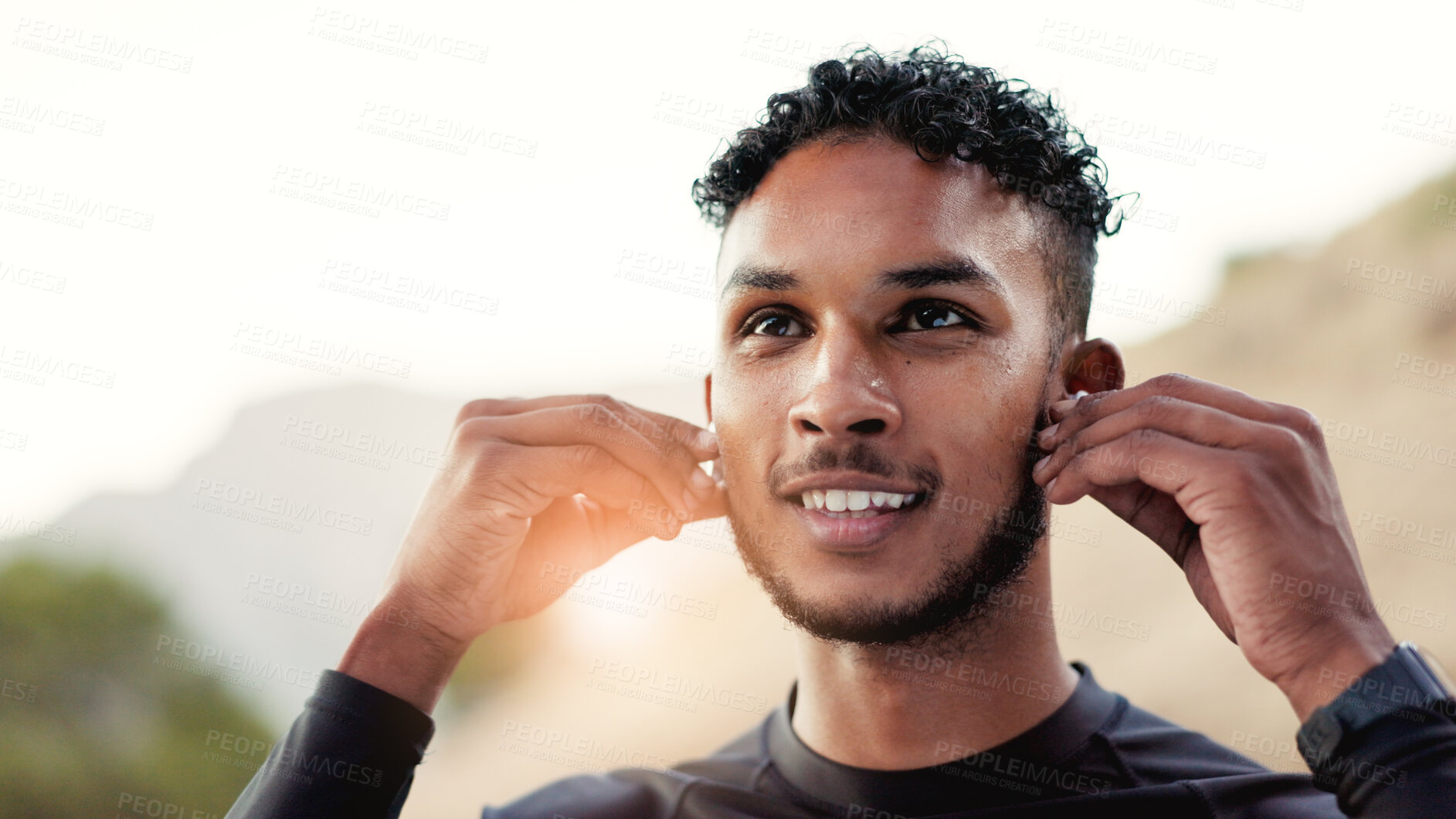 Buy stock photo Fitness, music and thinking with man outdoor for start of cardio training or workout routine. Earphones, exercise and vision with happy runner in nature for challenge, physical activity or wellness