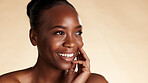 Thinking, skincare and black woman in studio with smile, beauty mockup and dermatology for glow. Space, confidence and African person with wellness, shine or aesthetic with cosmetics on background
