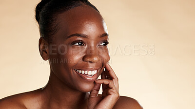 Buy stock photo Thinking, skincare and black woman in studio with smile, beauty mockup and dermatology for glow. Space, confidence and African person with wellness, shine or aesthetic with cosmetics on background