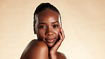 Portrait, dermatology and black woman in studio with aesthetic, beauty mockup and cosmetics for glow. Space, confidence and African person with wellness, shine or smile with skincare on background