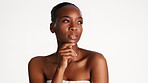 Thinking, beauty and black woman in studio, cosmetics and dermatology on white background. Space, reflection or African person with wellness, skincare for shine or contemplation for glow or aesthetic