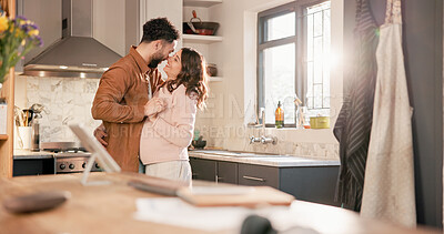 Buy stock photo Smile, dance and couple in kitchen for love, anniversary celebration or romance with happy partner. Moving, woman and man in home with music, holding hands and nose touch for healthy relationship