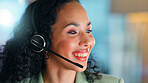 Happy woman, night and business agent with headset in office for telecommunication or online advice. Female person, consultant or working late with smile or mic for virtual assistance in workplace