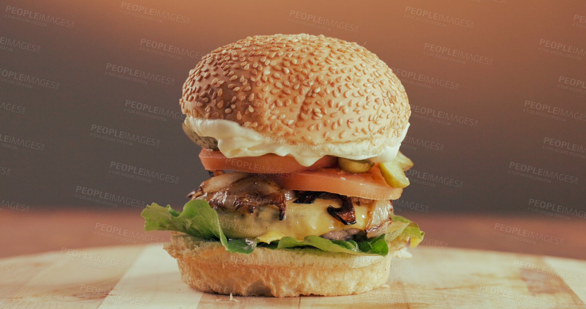 Buy stock photo Beef, burger and fast food in restaurant for takeaway order, lunch or catering service for hospitality. Delicious, meal and vegetables on wooden board with meat, lettuce and tomato for tasty dish.