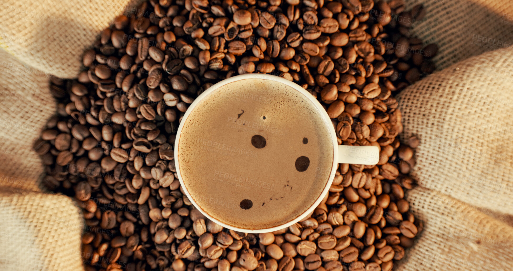 Buy stock photo Above, beans and coffee cup in cafe with foam, warm drink and caffeine in latte for morning beverage. Mug, brown liquid or cappuccino in restaurant with froth, espresso ingredients or delicious brew.