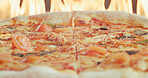 Oven, pizza and baking in restaurant with flame, tomato and traditional Italian cuisine for catering. Fire, meal and flatbread cooking in diner for food preparation, takeaway lunch and hospitality.