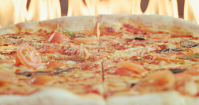 Buy stock photo Oven, pizza and baking in restaurant with flame, tomato and traditional Italian cuisine for catering. Fire, meal and flatbread cooking in diner for food preparation, takeaway lunch and hospitality.