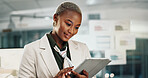 Black woman, tablet and typing with report in office for graphic design, project or scroll at startup company. Person, designer and smile with tech, notes or editing proposal on app at digital agency