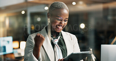 Buy stock photo Happy, black woman and winning with tablet at night for promotion or business success in office. Excited, female person or working late with smile or technology for bonus or good news in workplace