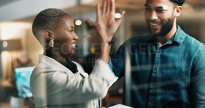 Buy stock photo Happy people, night and business with high five in office for teamwork or deadline success. Businessman, woman or colleagues working late with smile for achievement, promotion or winning together