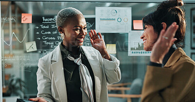 Buy stock photo Happy women, night and teamwork with high five in office for business success or profit. Excited, female people or colleagues working late with smile for company improvement or good job in workplace