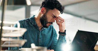 Buy stock photo Man, headache and challenge in office with laptop, burnout and fatigue for journalist investigation. Tired, person and writer in workplace with computer, migraine and frustrated for fake news report.