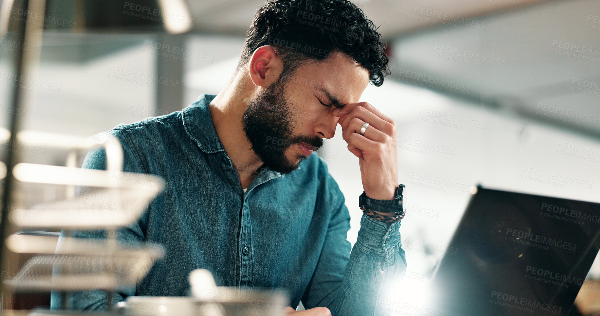 Buy stock photo Man, headache and challenge in office with laptop, burnout and fatigue for journalist investigation. Tired, person and writer in workplace with computer, migraine and frustrated for fake news report.