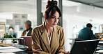 Journalist, woman and reading in office with laptop, research and online investigation for article. Coworking, mature person and review news report in agency with computer, website and update blog.