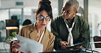 Women, tablet and team with documents in office at typing, review or collaboration for project at finance company. Business people, tech and app with report, feedback or asset management at agency