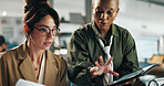 Women, tablet and team with paperwork in office at typing, review or collaboration for project at finance company. Business people, tech and app with report, feedback or asset management at agency