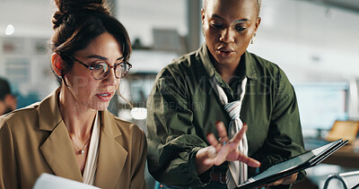 Buy stock photo Women, tablet and team with paperwork in office at typing, review or collaboration for project at finance company. Business people, tech and app with report, feedback or asset management at agency