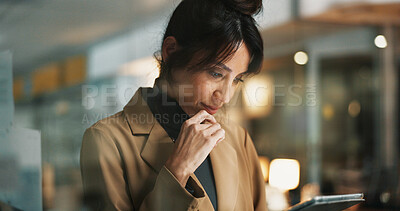 Buy stock photo Tablet, thinking and business woman in office at night for compliance review, project or report. Tech, mature person and advisor in workplace for overtime, reading email or policy planning with idea