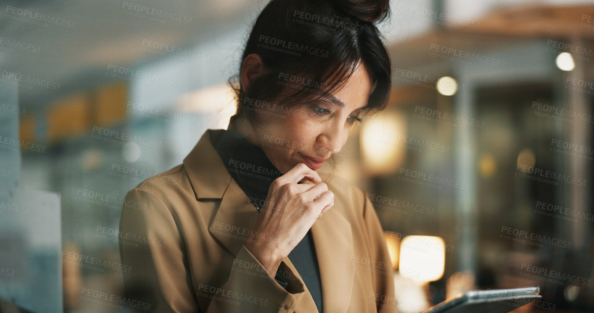 Buy stock photo Tablet, thinking and business woman in office at night for compliance review, project or report. Tech, mature person and advisor in workplace for overtime, reading email or policy planning with idea